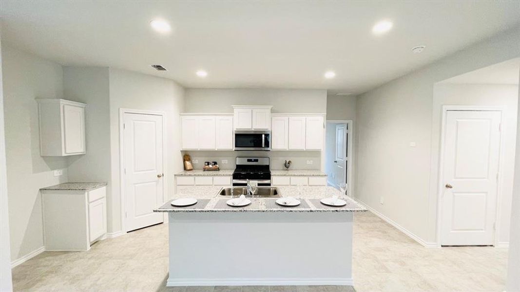 Kitchen - All Home and community information, including pricing, included features, terms, availability and amenities, are subject to change at any time without notice or obligation. All Drawings, pictures, photographs, video, square footages, floor plans, elevations, features, colors and sizes are approximate for illustration purposes only and will vary from the homes as built.