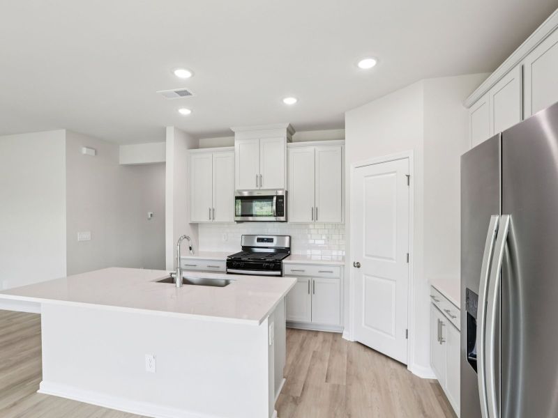 Furnished interior view inside a new home in River Glen, Angier (Image 3).