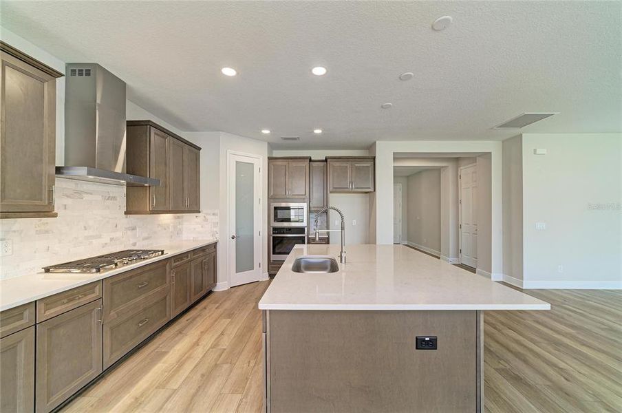 Furnished interior view inside a new home in Pasadena Woods, Pasadena Hills (Image 10).