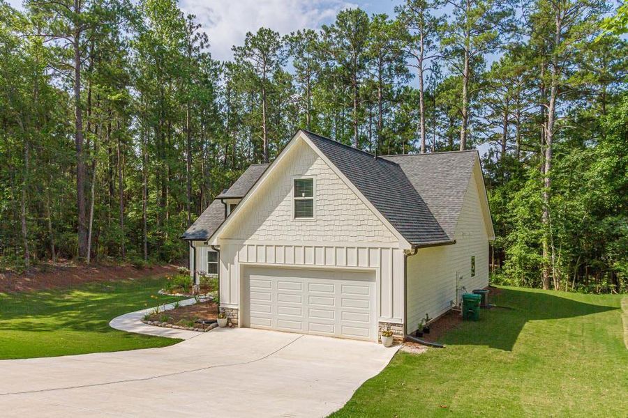 Front exterior of a new home in , Monticello, GA, highlighting curb appeal (Image 24).
