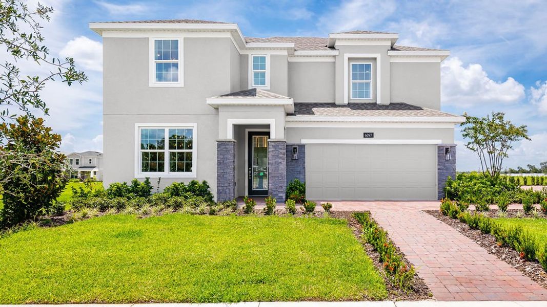 Representative exterior photo of a completed home built from the Newcastle by Risewell Homes in Trinity Lakes, Groveland, FL (Image 1). Representative exterior photo of a completed home built from the Newcastle by Risewell Homes in Trinity Lakes, Groveland, FL (Image 1).