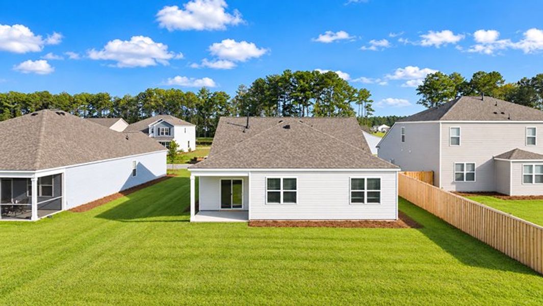 Exterior details and patio area of a home in Pine Hills at Cane Bay, Summerville (Image 3).