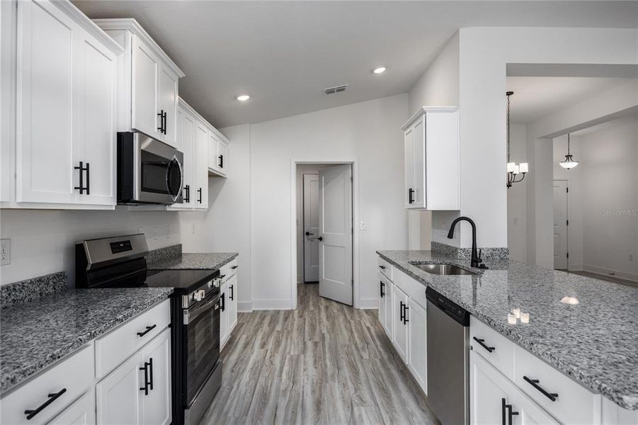 Furnished interior view inside a new home in , Lake City (Image 8).