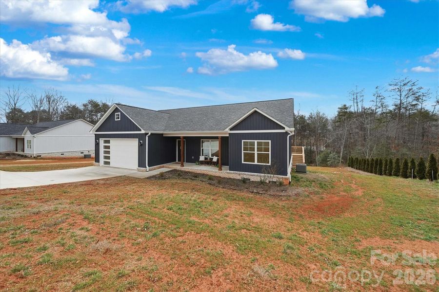 Front exterior of a new home in , Taylorsville, NC, highlighting curb appeal (Image 26).