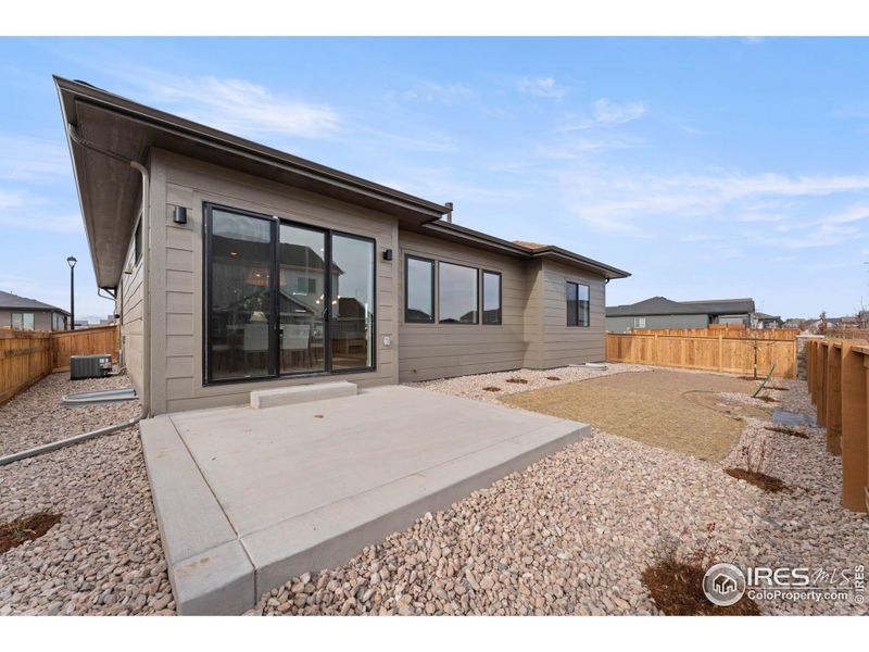 Exterior details and patio area of a home in Greenspire At Windsor Lake, Windsor (Image 24).