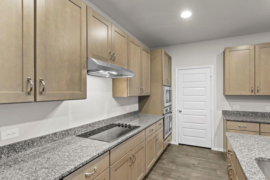 Furnished interior view inside a new home in Oaks at San Gabriel, Georgetown (Image 10).