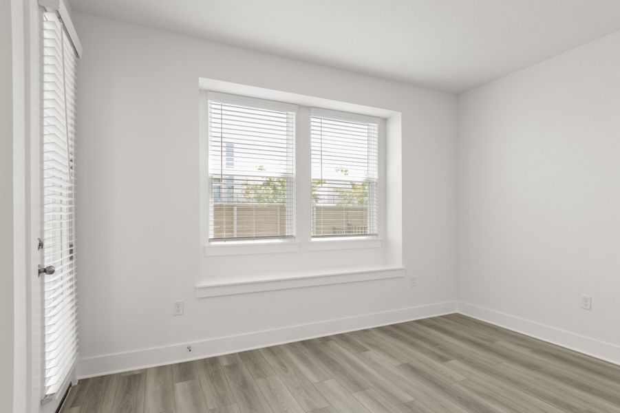 Spacious, unfurnished interior of a new home in Center 45, Round Rock (Image 24).
