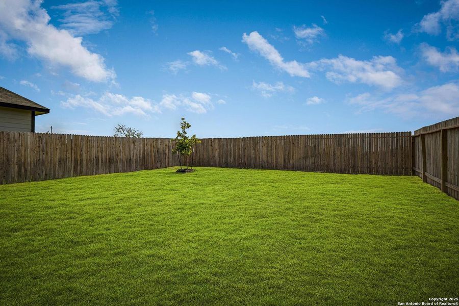Front exterior of a new home in Morgan Meadows, San Antonio, TX, highlighting curb appeal (Image 1). Front exterior of a new home in Morgan Meadows, San Antonio, TX, highlighting curb appeal (Image 1).