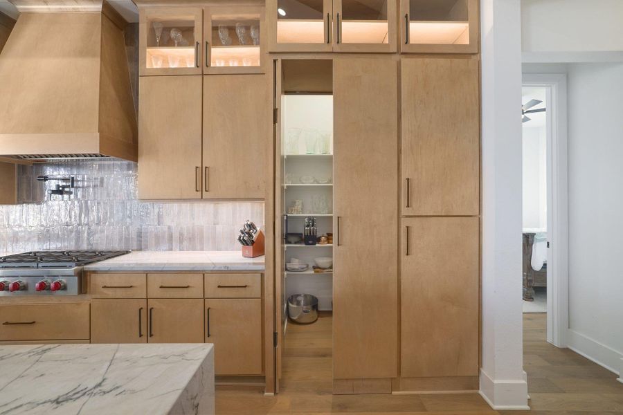 Bathed in natural light, the dining area provides an inviting setting for gatherings large and small.