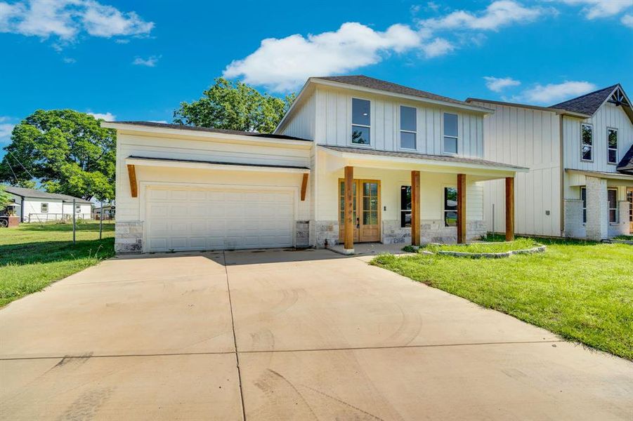 Front exterior of a new home in , Kemp, TX, highlighting curb appeal (Image 18).
