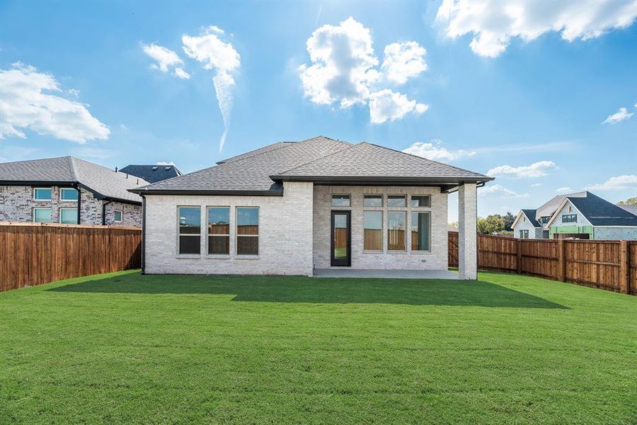 Exterior details and patio area of a home in Devonshire, Heath (Image 27).