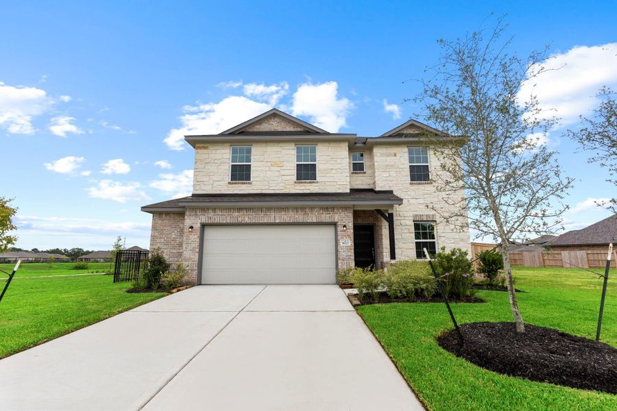 Welcome to your dream home! This stunning two-story Concho plan by CastleRock Communities boasts an eye-catching brick and stone exterior, nestled on a prime corner lot with peaceful lake views and lush green space on the side—offering both beauty and privacy. Welcome to your dream home! This stunning two-story Concho plan by CastleRock Communities boasts an eye-catching brick and stone exterior, nestled on a prime corner lot with peaceful lake views and lush green space on the side—offering both beauty and privacy.