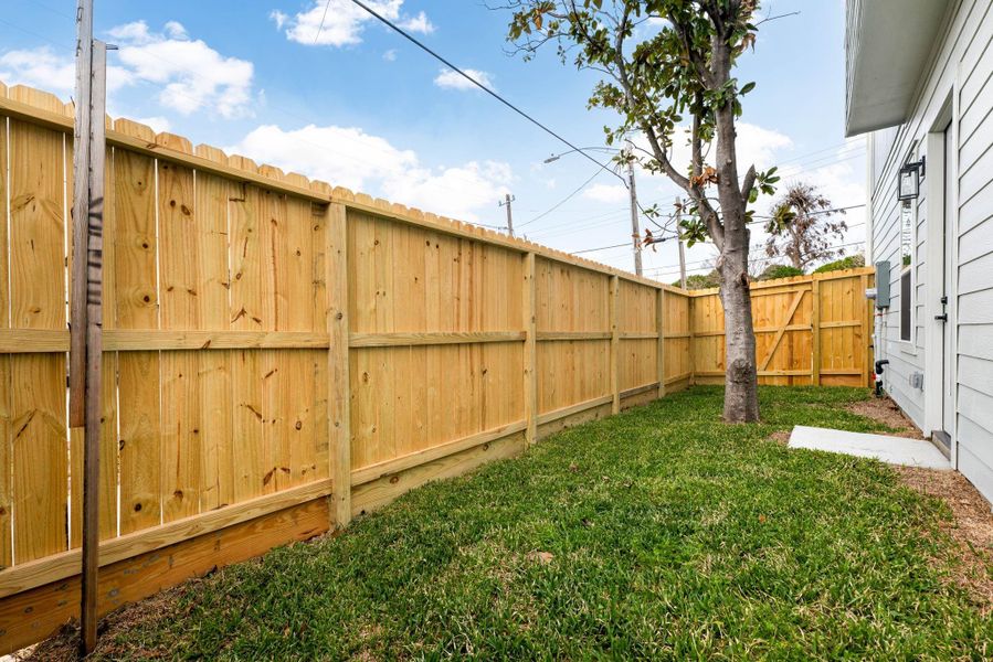 Relish the charm of a private side yard, offering endless possibilities to create your own cozy outdoor sanctuary. Whether you envision a tranquil garden, a relaxing lounge area, or an inviting space for entertaining, this serene retreat is the perfect canvas to bring your dream outdoor oasis to life. Relish the charm of a private side yard, offering endless possibilities to create your own cozy outdoor sanctuary. Whether you envision a tranquil garden, a relaxing lounge area, or an inviting space for entertaining, this serene retreat is the perfect canvas to bring your dream outdoor oasis to life.