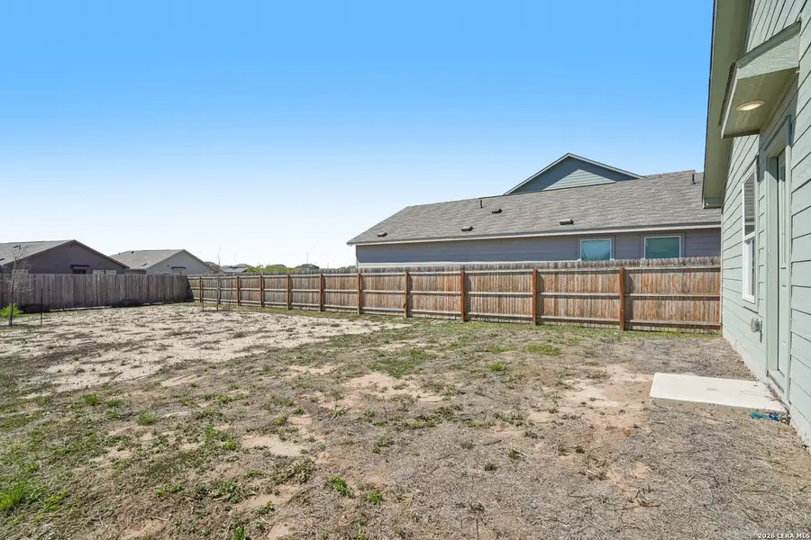 Exterior details and patio area of a home in Valle Sol, Von Ormy (Image 4).