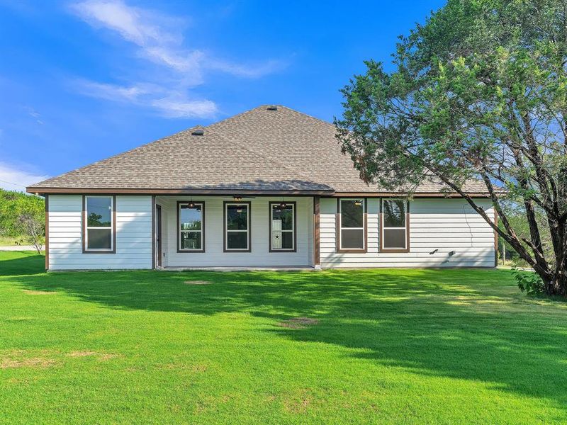 Front exterior of a new home in , Granbury, TX, highlighting curb appeal (Image 2). Front exterior of a new home in , Granbury, TX, highlighting curb appeal (Image 2).