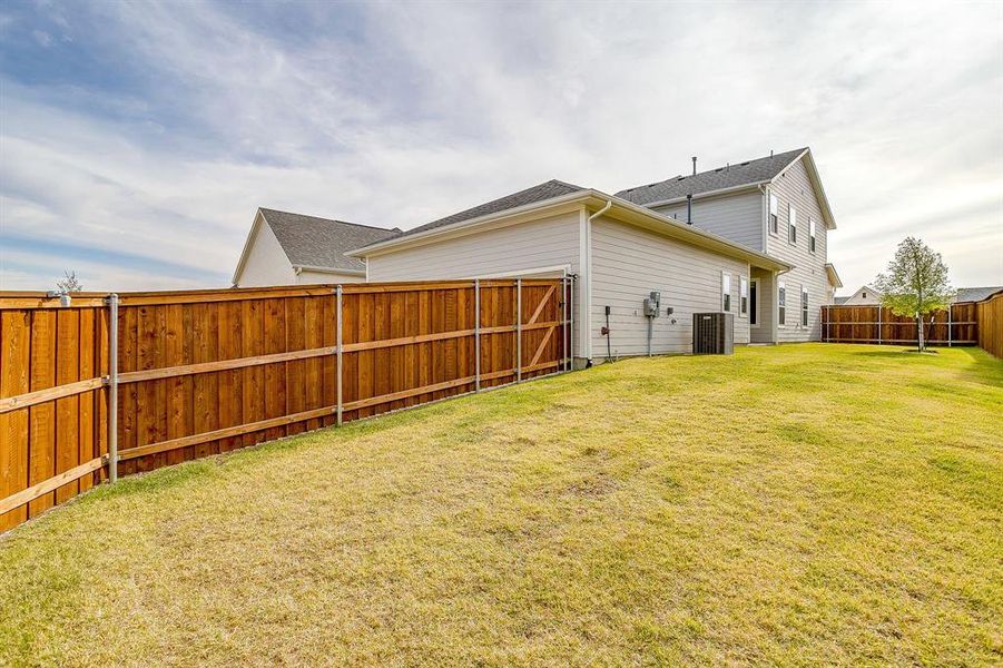 Exterior details and patio area of a home in Walsh, Fort Worth (Image 4). Exterior details and patio area of a home in Walsh, Fort Worth (Image 4).