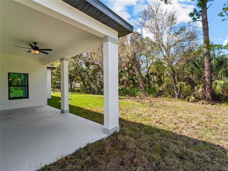 Exterior details and patio area of a home in , North Port (Image 38).
