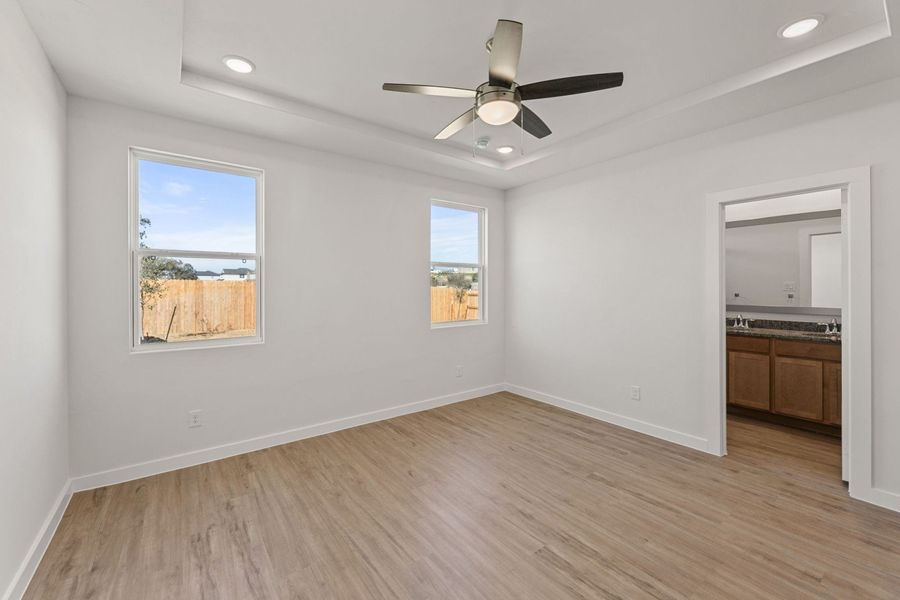 Representative unfurnished interior of a home built from the Clovis by Hakes Brothers in Hunters Ranch, San Antonio (Image 20).
