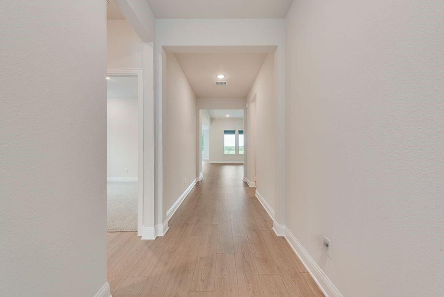 Spacious, unfurnished interior of a new home in Valencia On The Lake, Little Elm (Image 30).