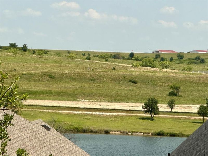 View of yard featuring a water view and a view of rural / pastoral area View of yard featuring a water view and a view of rural / pastoral area