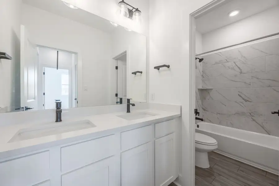 Furnished interior view inside a new home in Sage Collection – Freedom at Anthem, Kyle (Image 3).