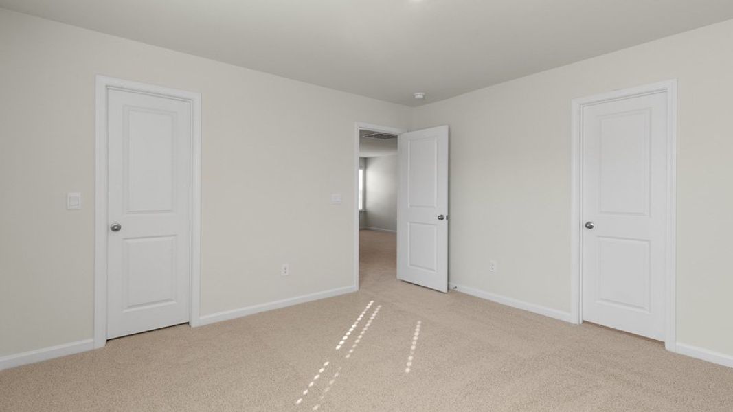 Spacious, unfurnished interior of a new home in The Reserve at Stoney Creek, Whitsett (Image 25).