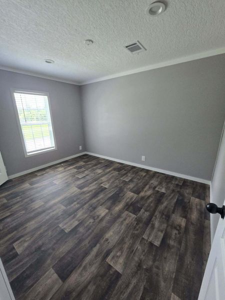Spacious, unfurnished interior of a new home in , St. Stephen (Image 8).