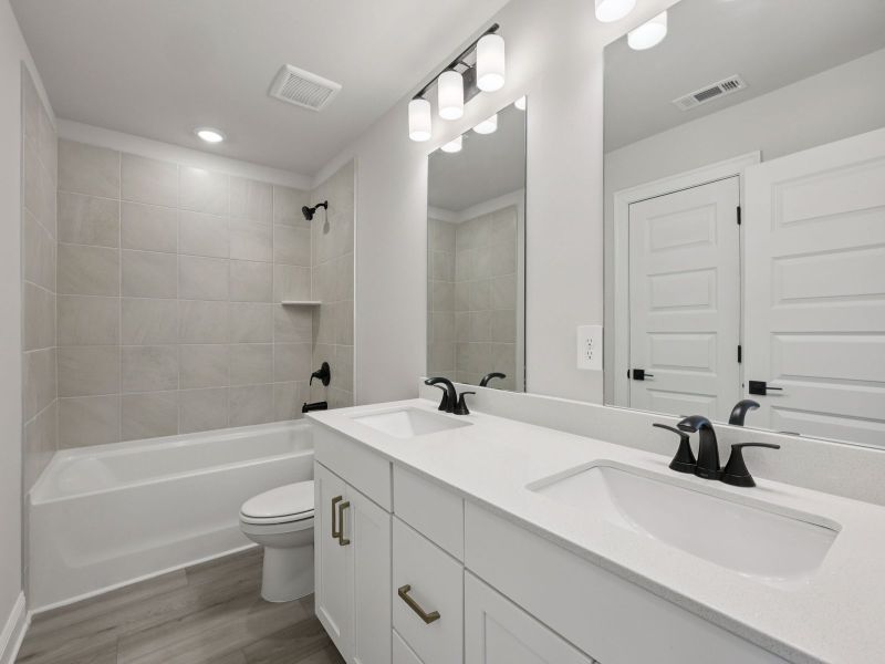 Furnished interior view inside a new home in Hemingway - Highland Series, Cumming (Image 11).