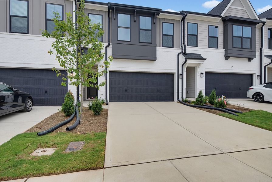 Front exterior of a new home in Sweetbrier, Durham, NC, highlighting curb appeal (Image 2). Front exterior of a new home in Sweetbrier, Durham, NC, highlighting curb appeal (Image 2).