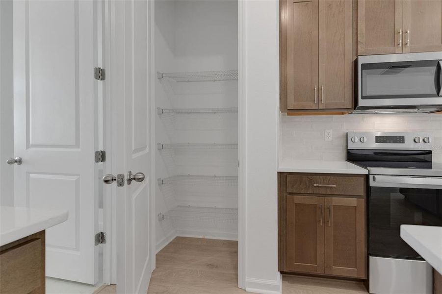 Furnished interior view inside a new home in Crossroads at Kelly Park, Apopka (Image 19).