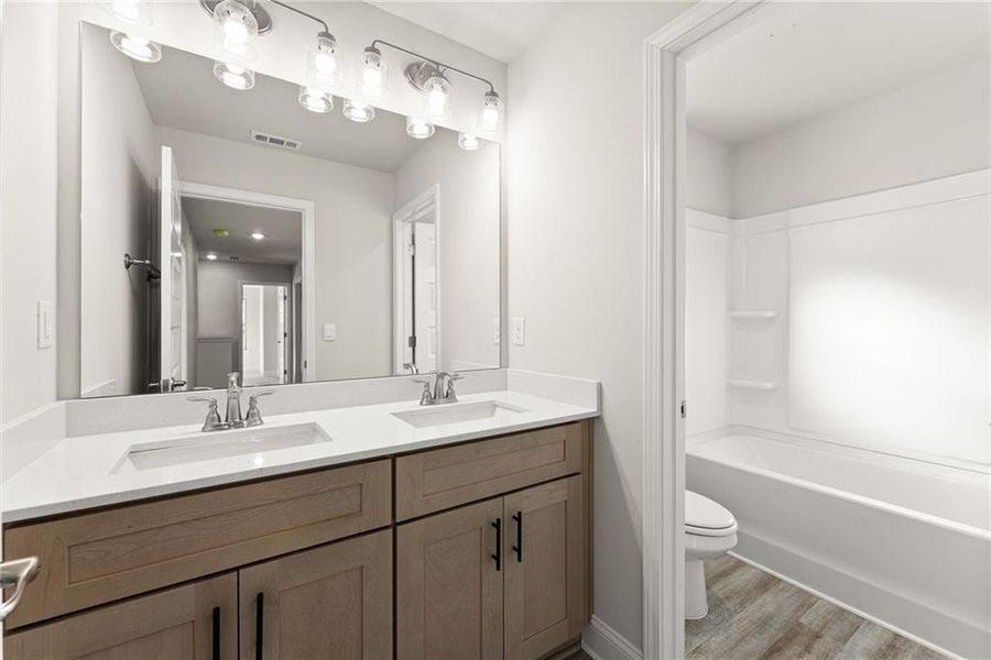 Furnished interior view inside a new home in Magnolia Villas, Cornelia (Image 5).