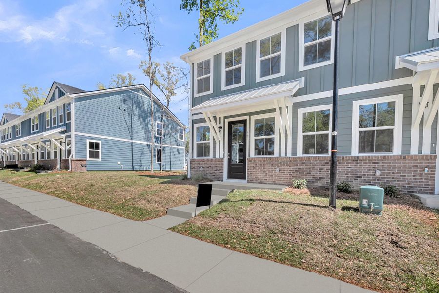 Exterior details and patio area of a home in Windward Village, Summerville (Image 3).