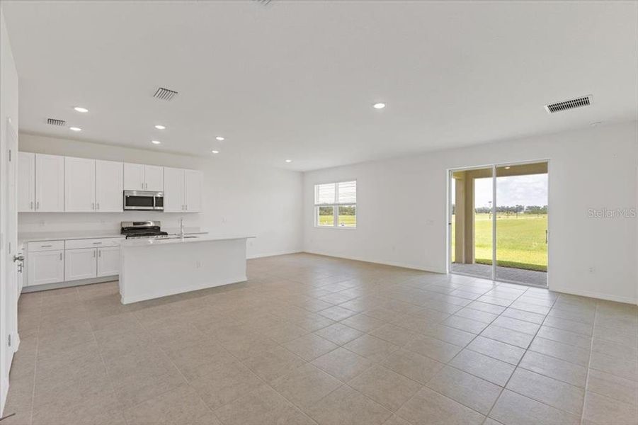 Spacious, unfurnished interior of a new home in Highfield at Twisted Oaks, Wildwood (Image 7).