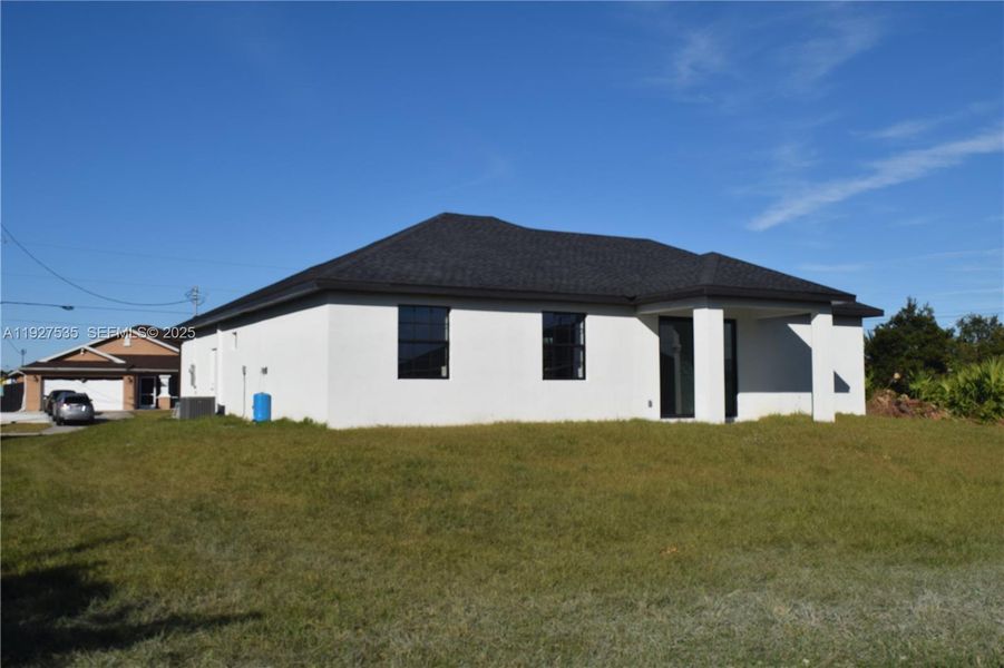 Exterior details and patio area of a home in , Lehigh Acres (Image 30). Exterior details and patio area of a home in , Lehigh Acres (Image 30).