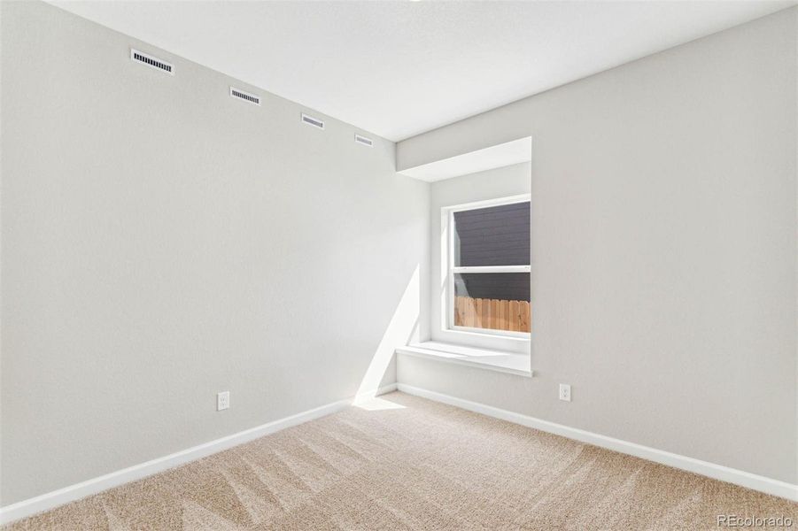 Spacious, unfurnished interior of a new home in Second Creek Farm, Commerce City (Image 14).