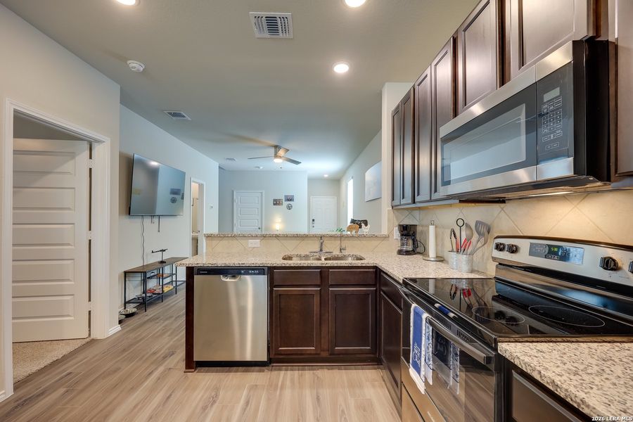 Furnished interior view inside a new home in Melissa Ranch, San Antonio (Image 14).
