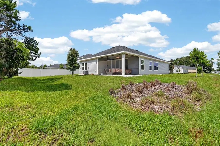 Exterior details and patio area of a home in , Ormond Beach (Image 27).