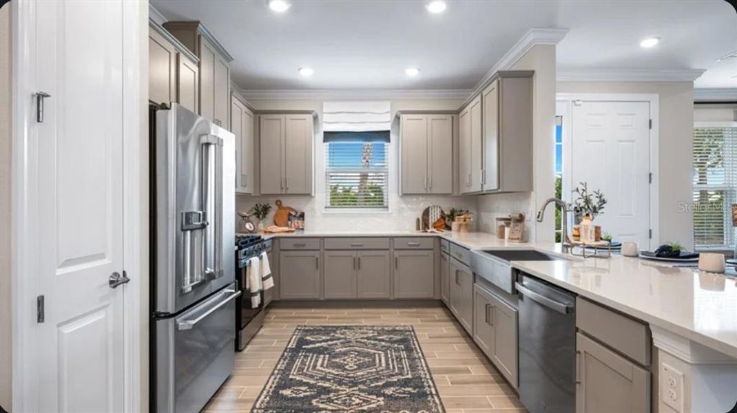 Furnished interior view inside a new home in Esplanade at Wiregrass Ranch, Wesley Chapel (Image 11).