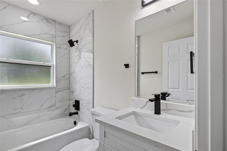 Furnished interior view inside a new home in , Dunnellon (Image 10).