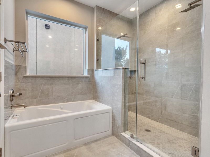 Primary Bath with standing shower and jetted tub - Third Floor Primary Bath with standing shower and jetted tub - Third Floor