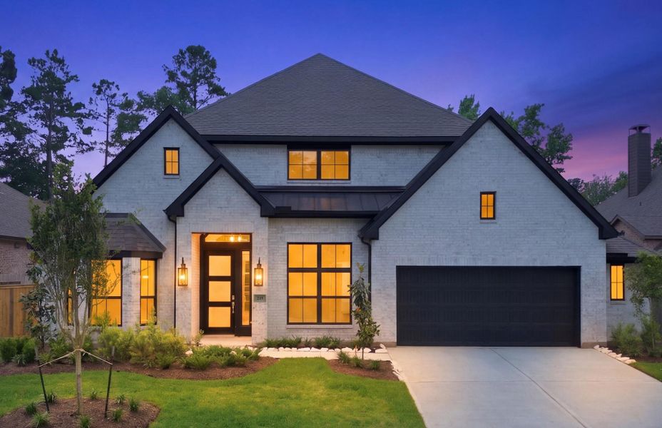 Front exterior of a new home in The Woodlands Hills 65′, Willis, TX, highlighting curb appeal (Image 2). Front exterior of a new home in The Woodlands Hills 65′, Willis, TX, highlighting curb appeal (Image 2).