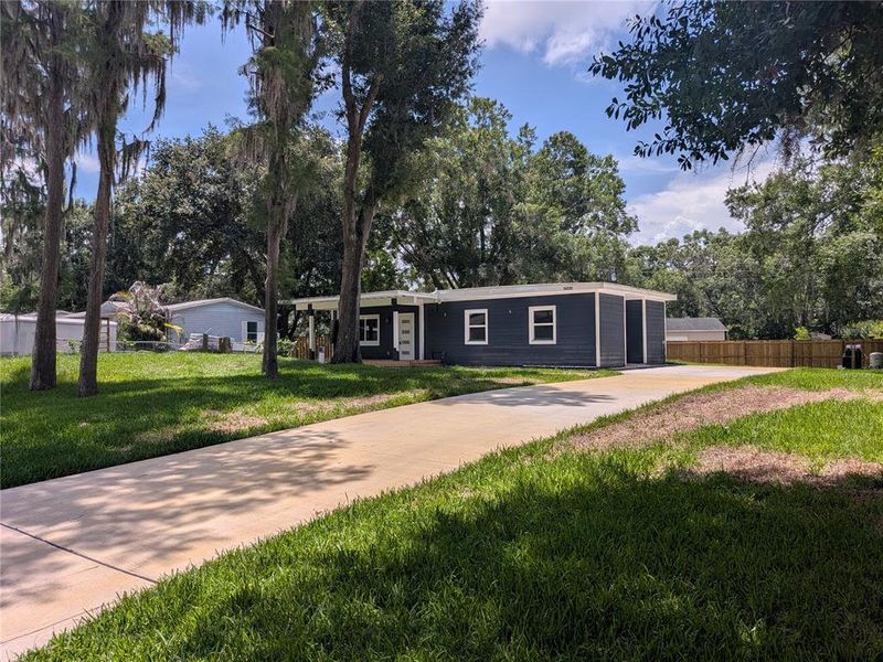 Front exterior of a new home in , Odessa, FL, highlighting curb appeal (Image 1). Front exterior of a new home in , Odessa, FL, highlighting curb appeal (Image 1).