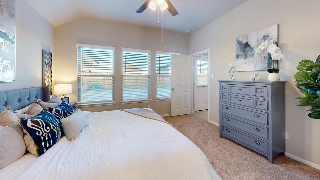 Furnished interior view inside a new home in Sunterra, Katy (Image 17).