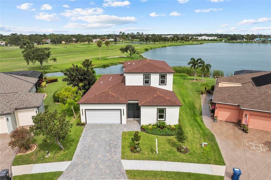 Front exterior of a new home in , Palmetto, FL, highlighting curb appeal (Image 25). Front exterior of a new home in , Palmetto, FL, highlighting curb appeal (Image 25).
