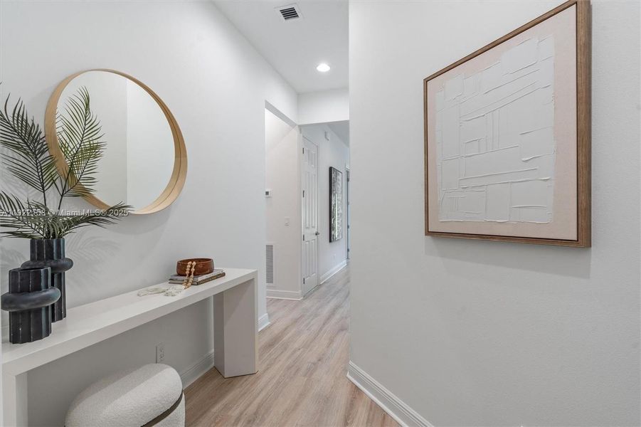 Furnished interior view inside a new home in PGA Village Verano, Port St. Lucie (Image 7).