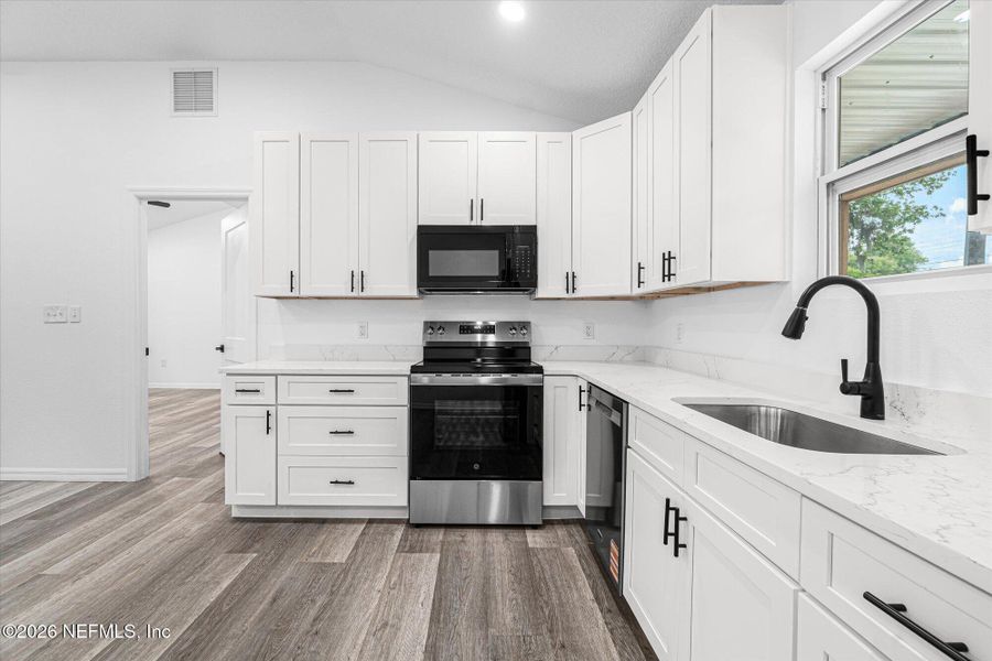 Furnished interior view inside a new home in , Satsuma (Image 4).