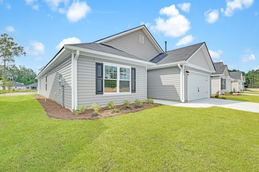 Representative exterior photo of a completed home built from the The Willow by Smith Family Homes in Heritage at New Riverside, Bluffton, SC (Image 2).