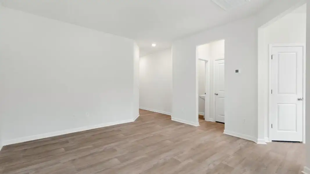 Spacious, unfurnished interior of a new home in The Townes at Galvins Ridge, Sanford (Image 14).