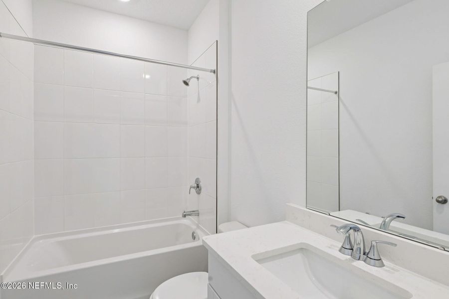 Furnished interior view inside a new home in Lakes at Bella Lago - Signature Series, Green Cove Springs (Image 8).