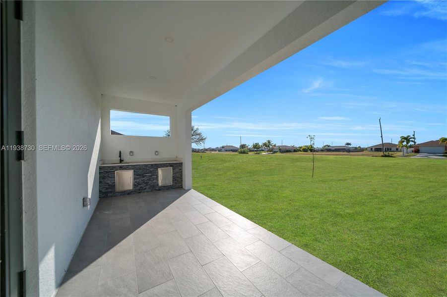 Exterior details and patio area of a home in , Cape Coral (Image 32).
